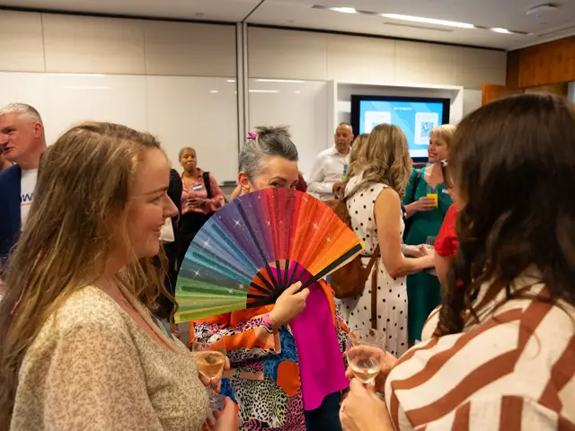 Guests talking at the Q2 2026 launch